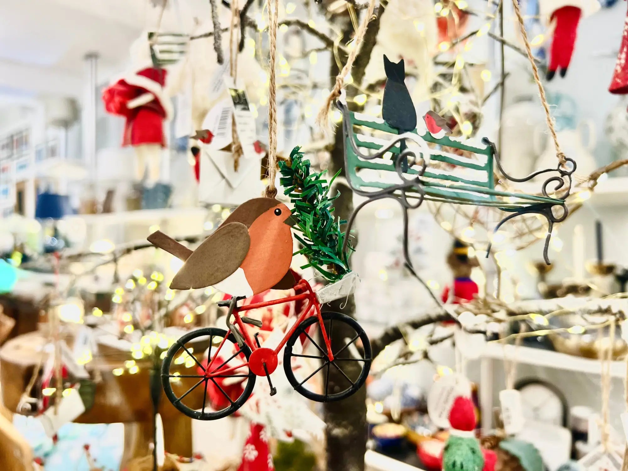 Charming red bicycle ornament with bird holding tinsel