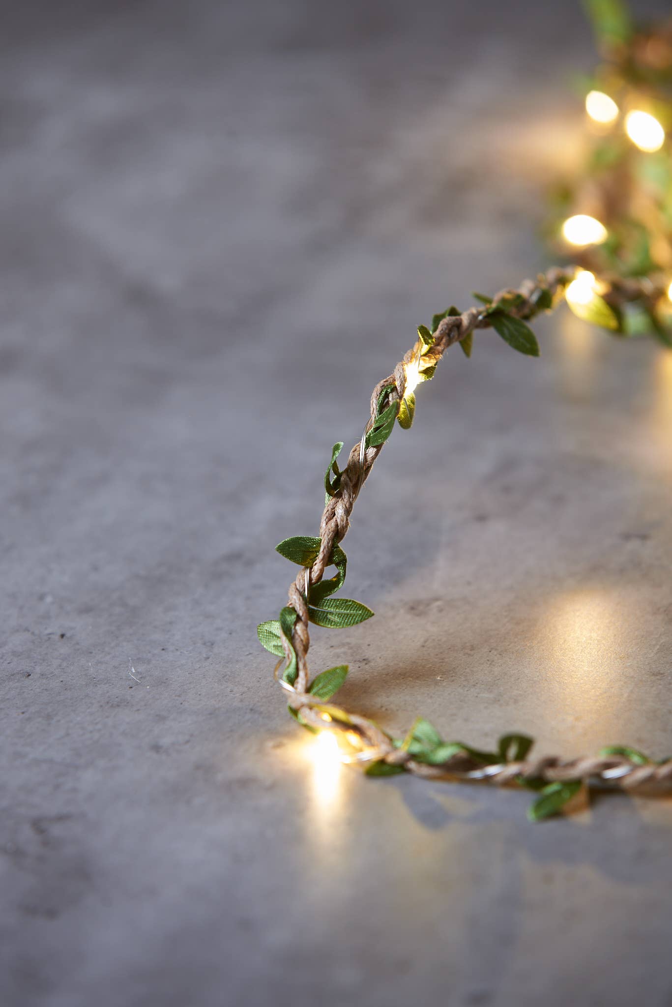 Leaf Twine: warm white LED lights woven through braided twine with green leaves