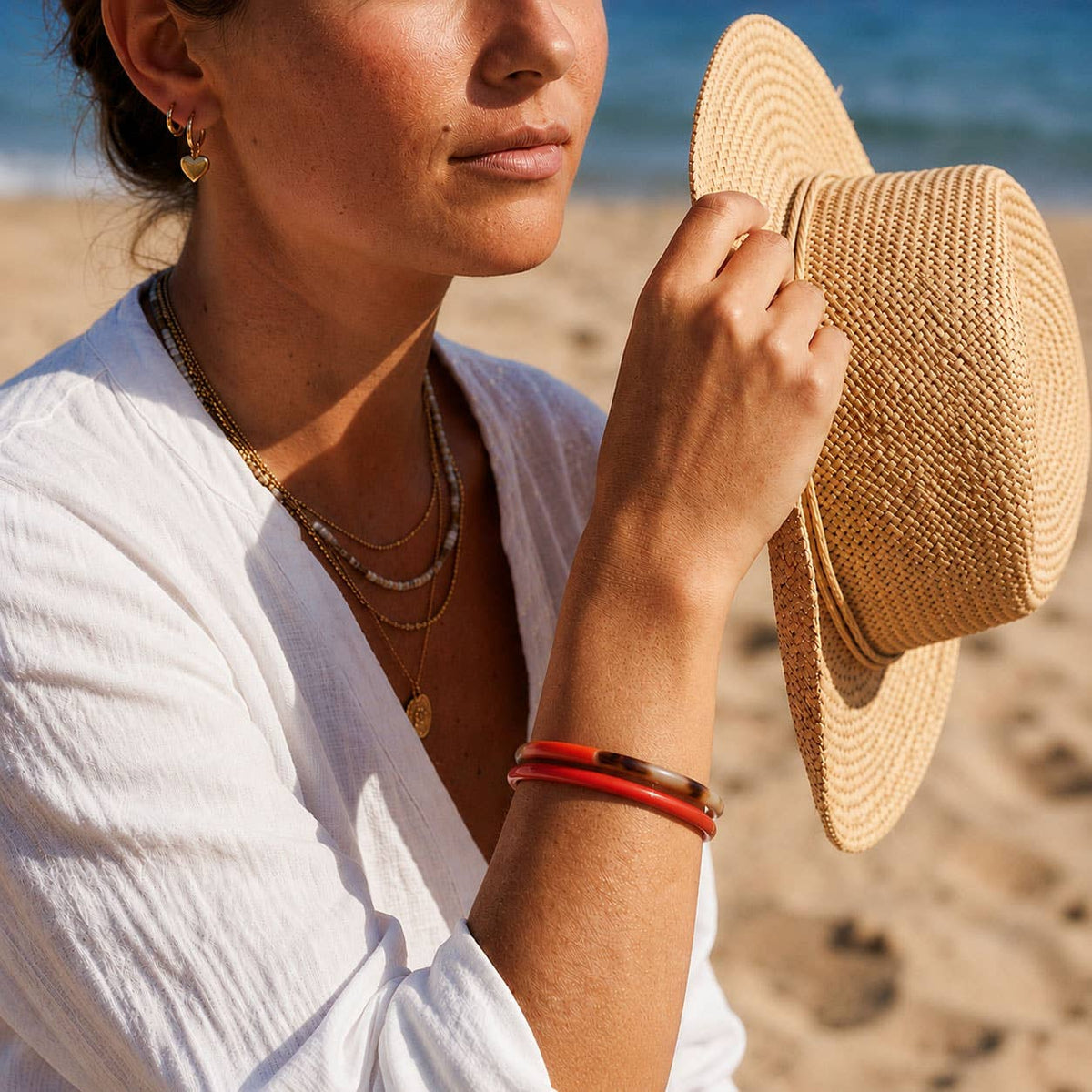 Zuri Set of three Slim orange and brown Natural Horn Bangles