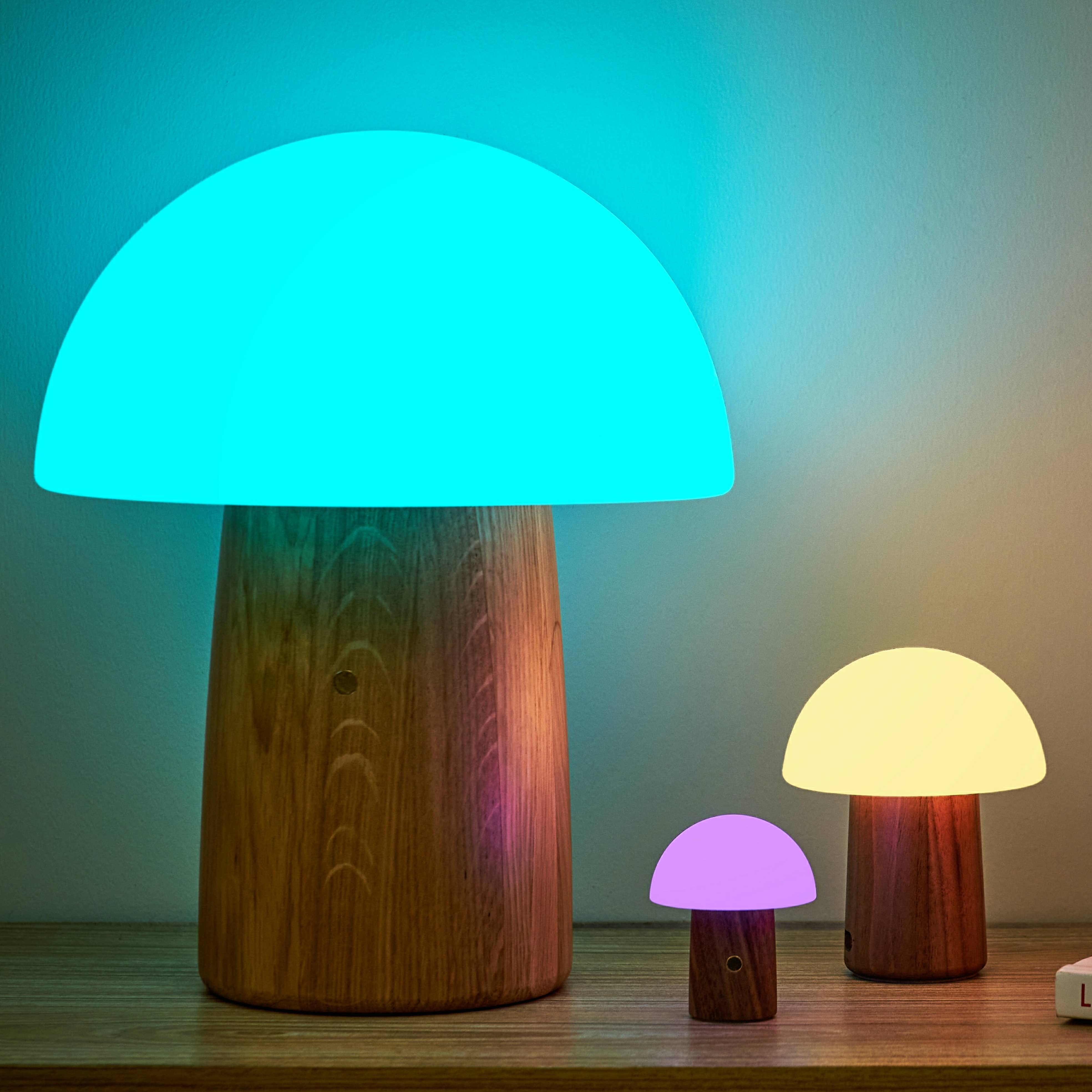 Glowing turquoise Alice Mushroom Lamp in super mini walnut size