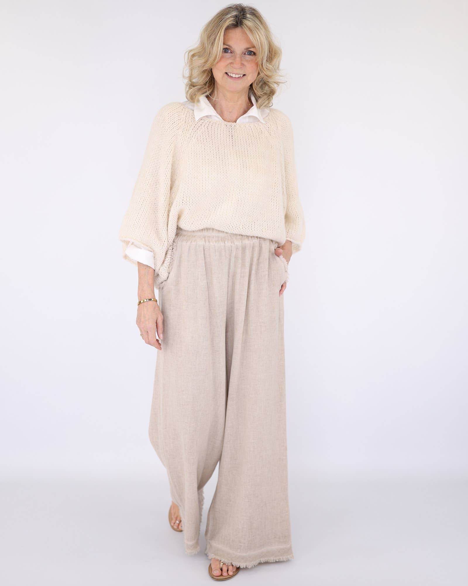 Beige wide-leg pants with frayed hem in Alpaca Blend Swing Jumper Soft Moss
