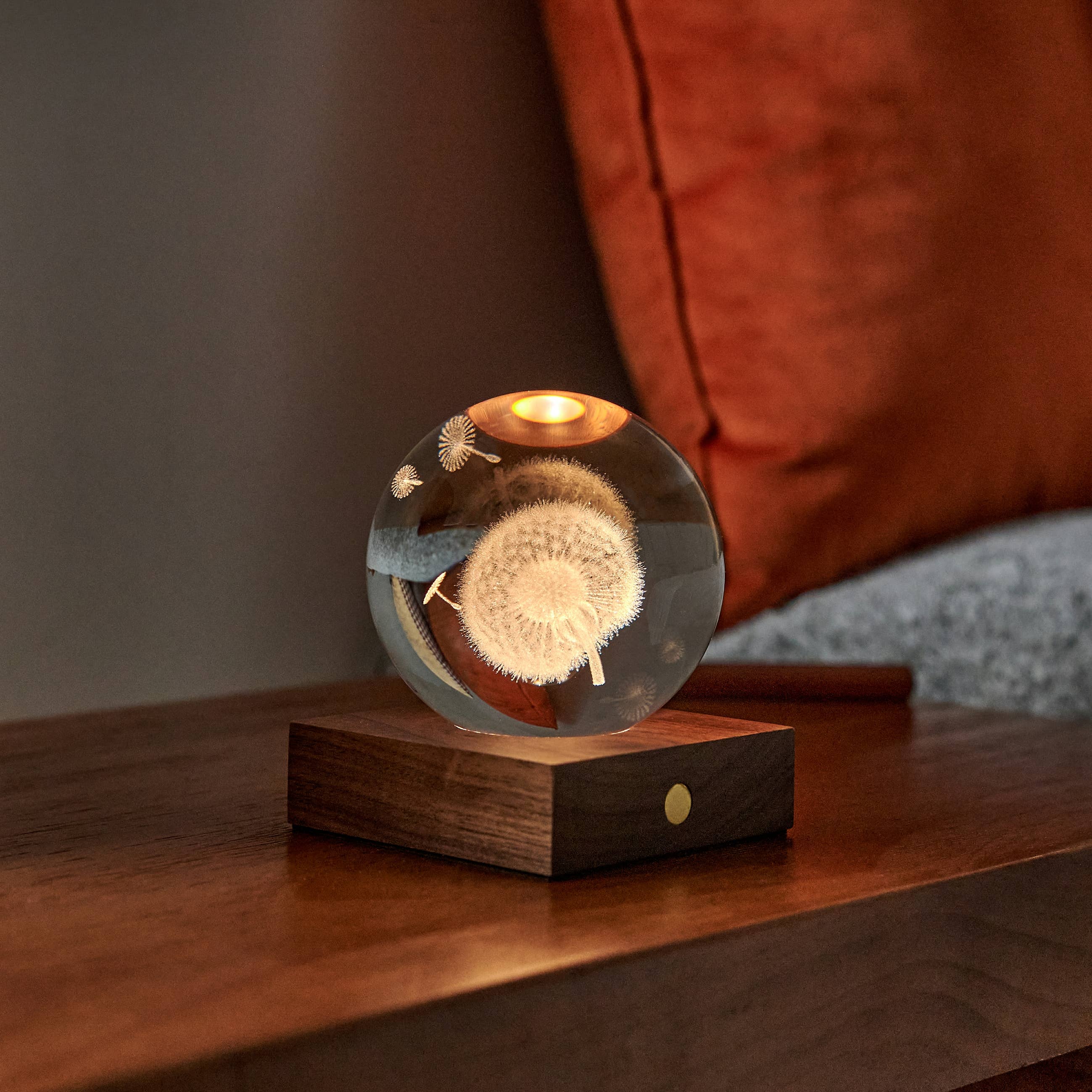 Amber Crystal Light Golf: etched dandelion glass sphere with warm candle glow