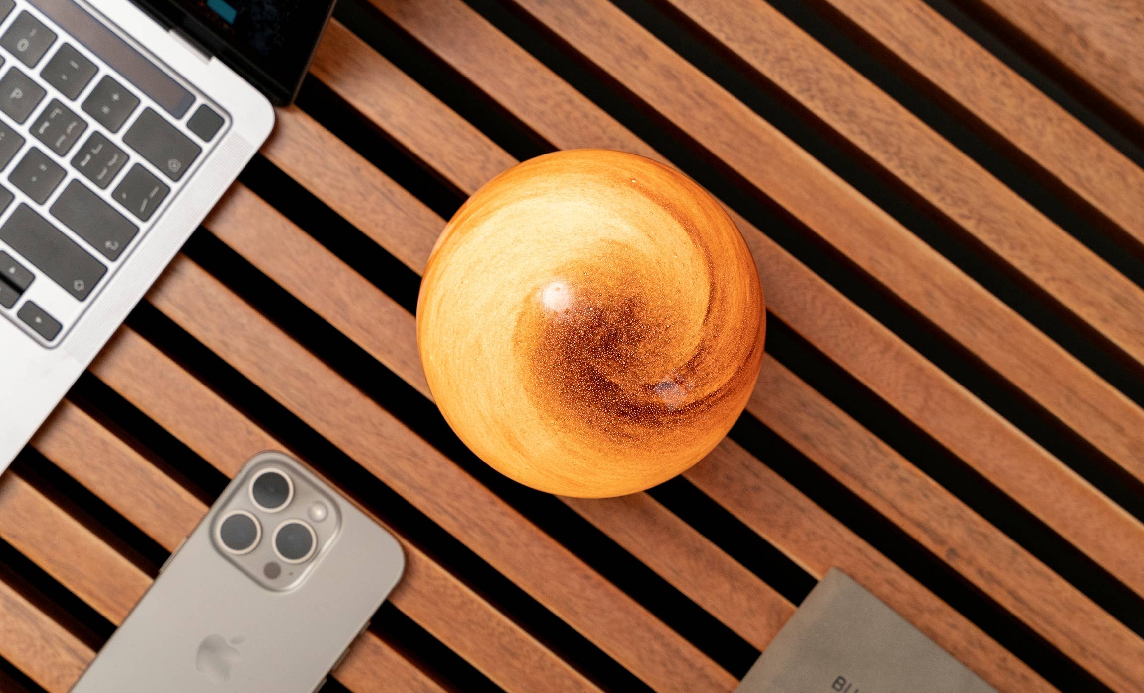 Large AstraGlass Light Sand Storm: amber-golden wooden sphere