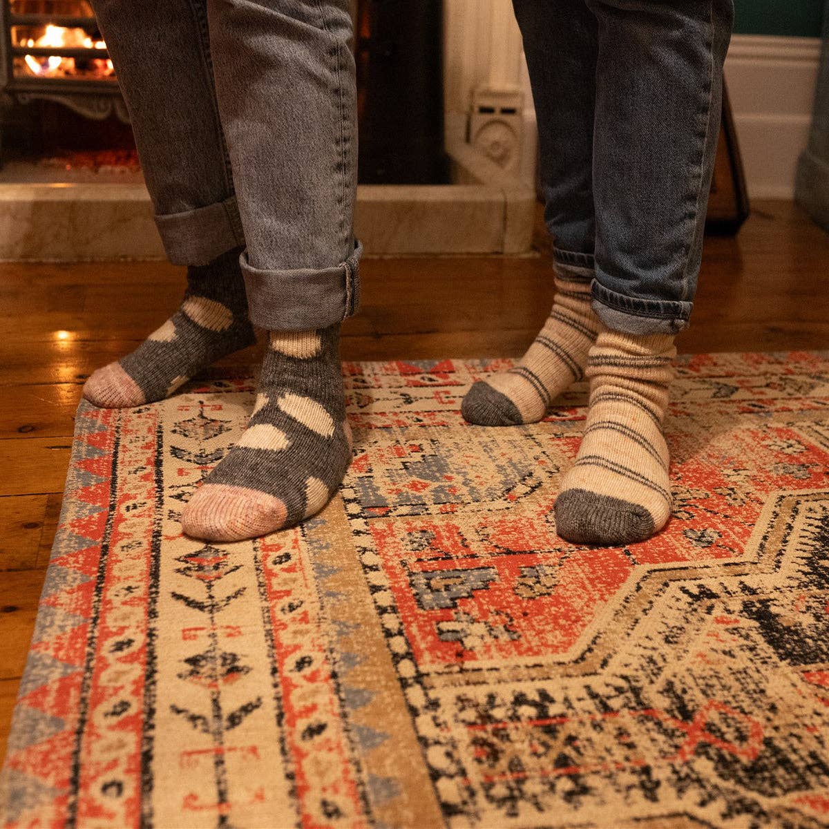 Cozy Big Spot thick knit socks in earthy tones by fireplace