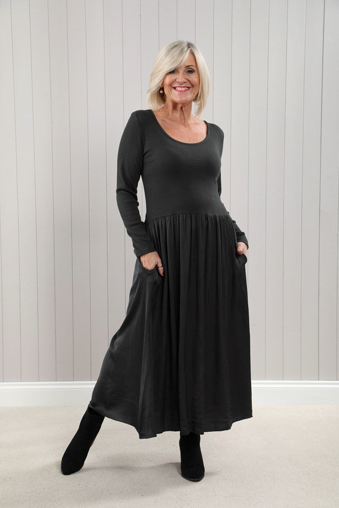 Black Venus Dress: long-sleeved maxi with gathered waist and pockets