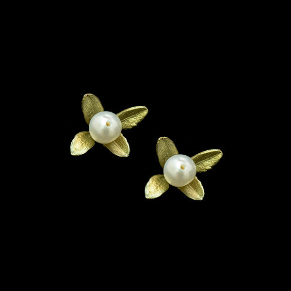 Gold-toned Boxwood stud earrings with leaf settings and white pearl