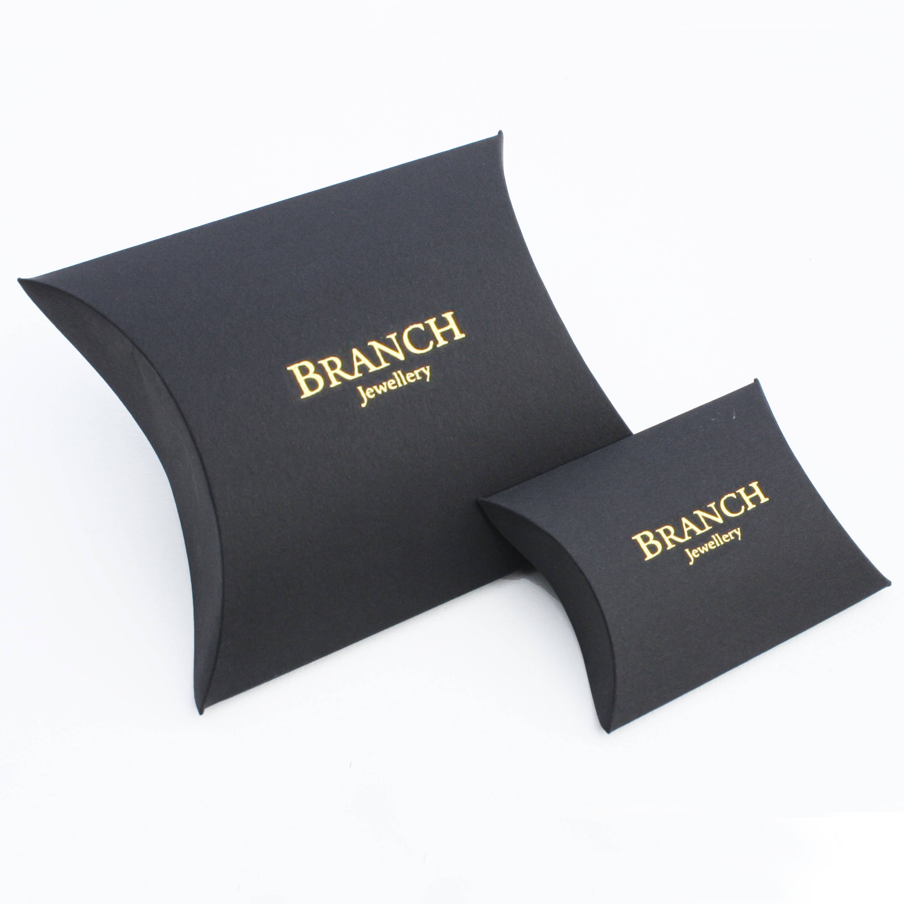 Black pillow-shaped gift box with gold Branch Jewellery lettering for Brown Natural Pebble Drop Horn earring