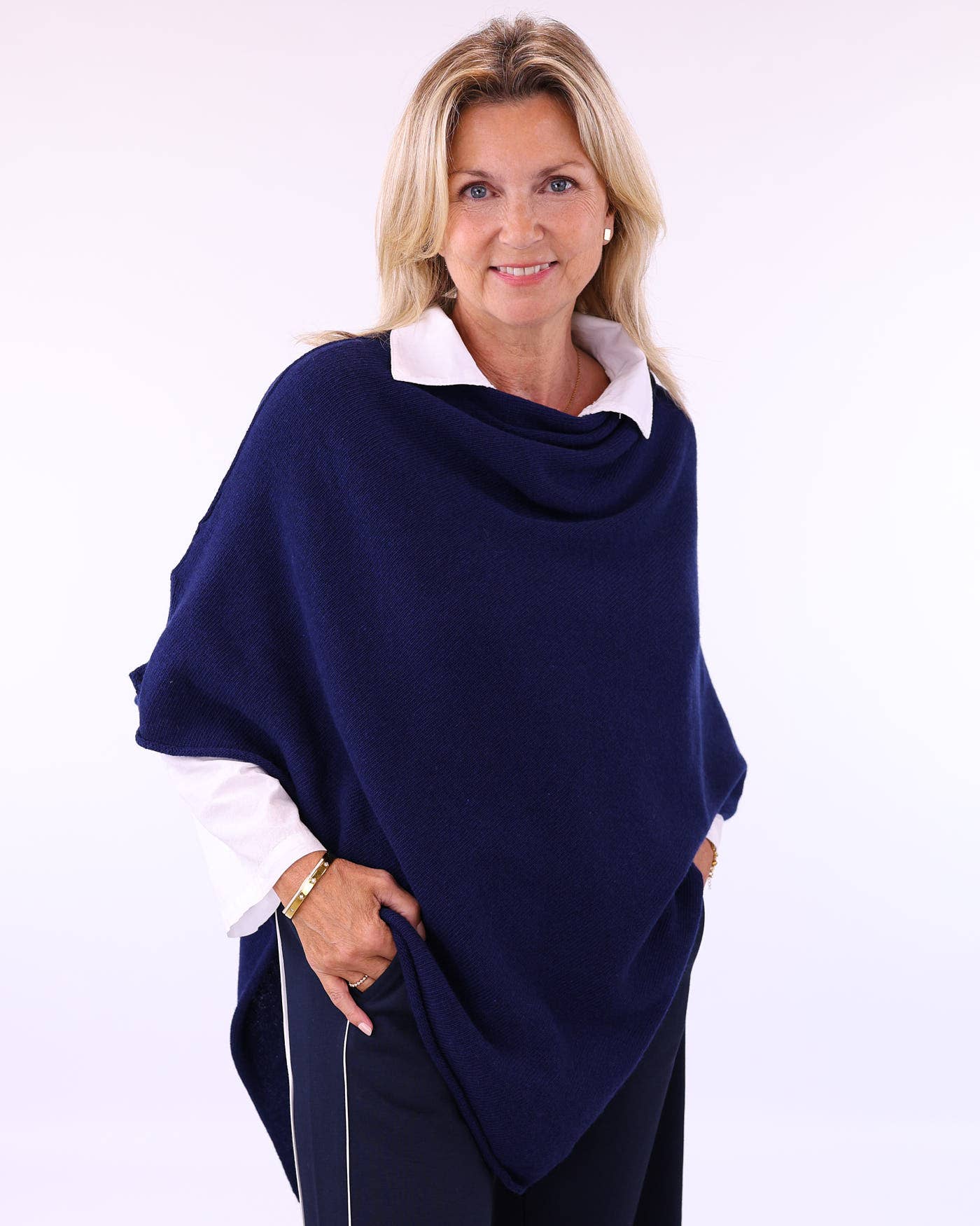 Navy blue cashmere blend poncho with cowl neck and white piping