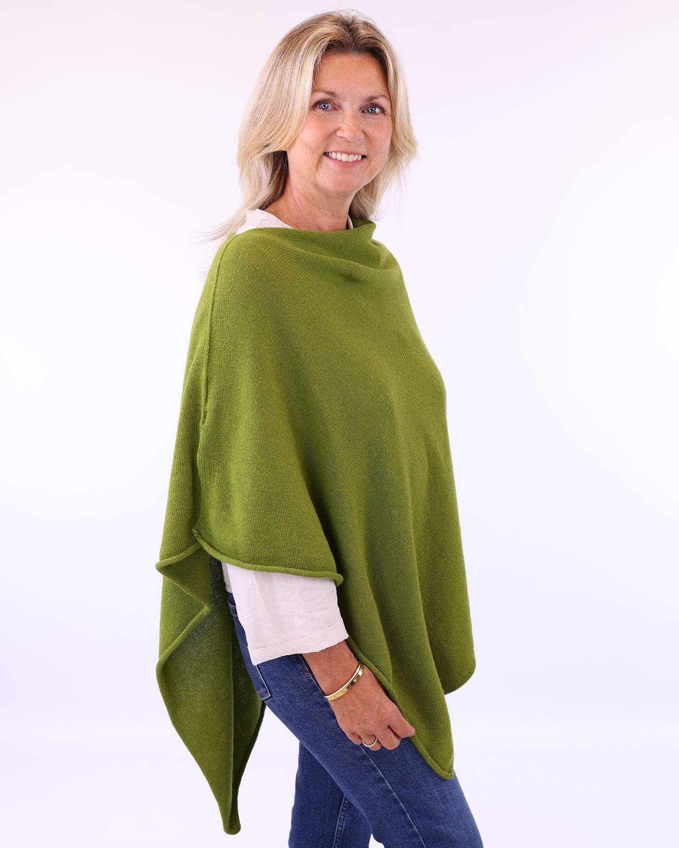 Soft olive-green cashmere blend knitted poncho with asymmetrical hemline