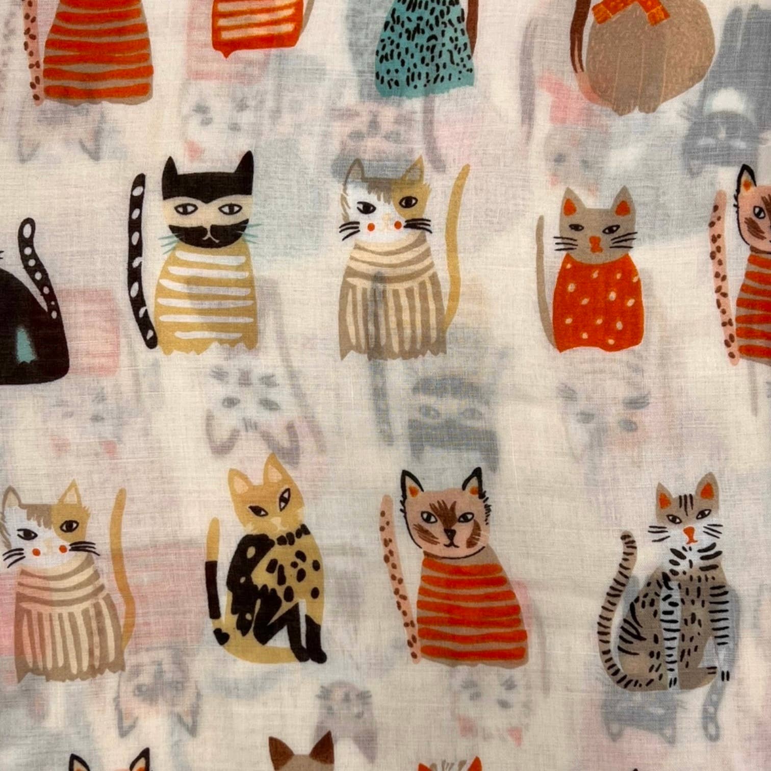 Beige cats wearing hats print scarf with colorful illustrated felines