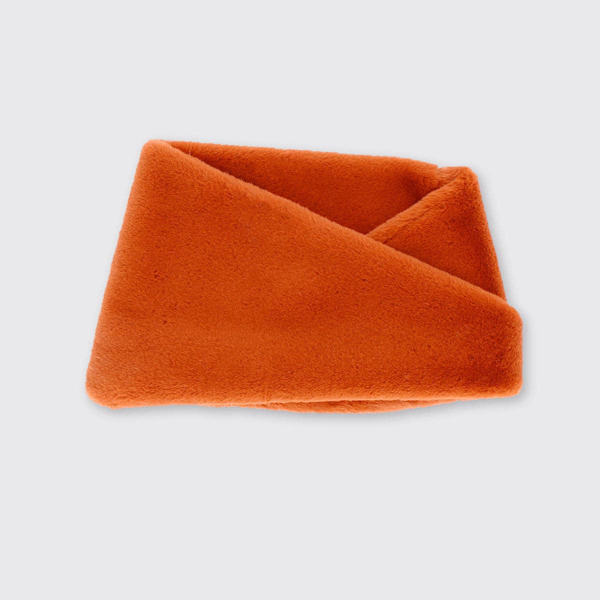 Chunky faux fur snood in vibrant salmon pink, plush and folded