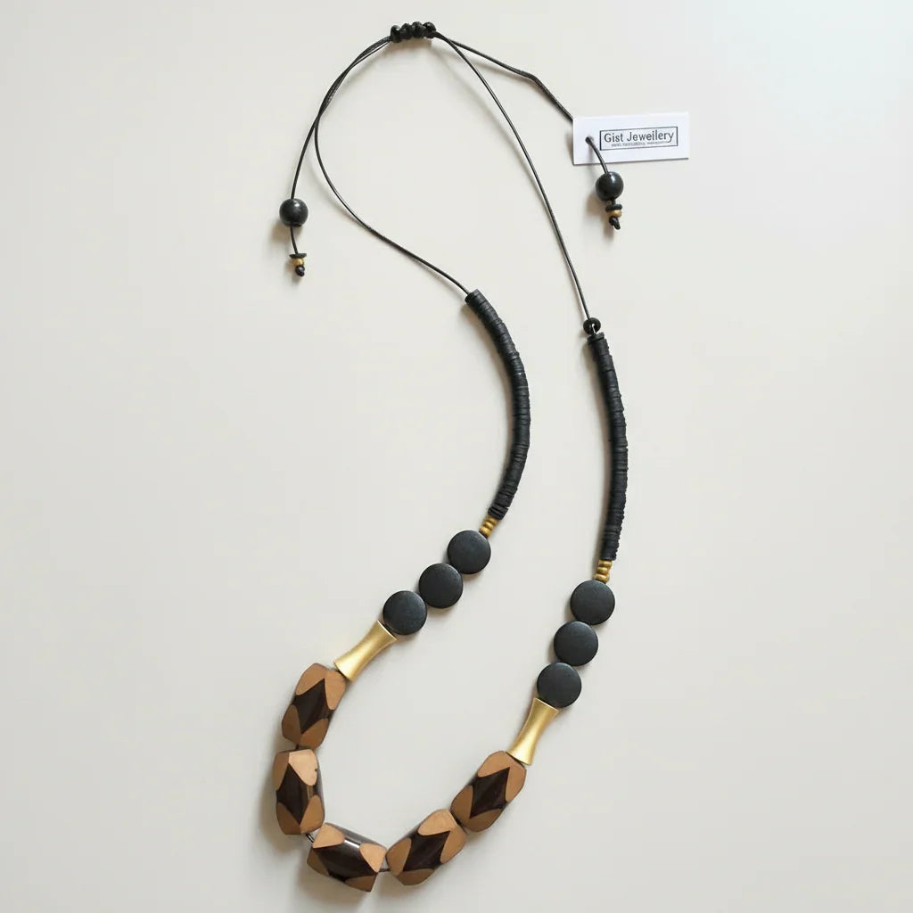 Black and gold beaded cord necklace with geometric wood accents