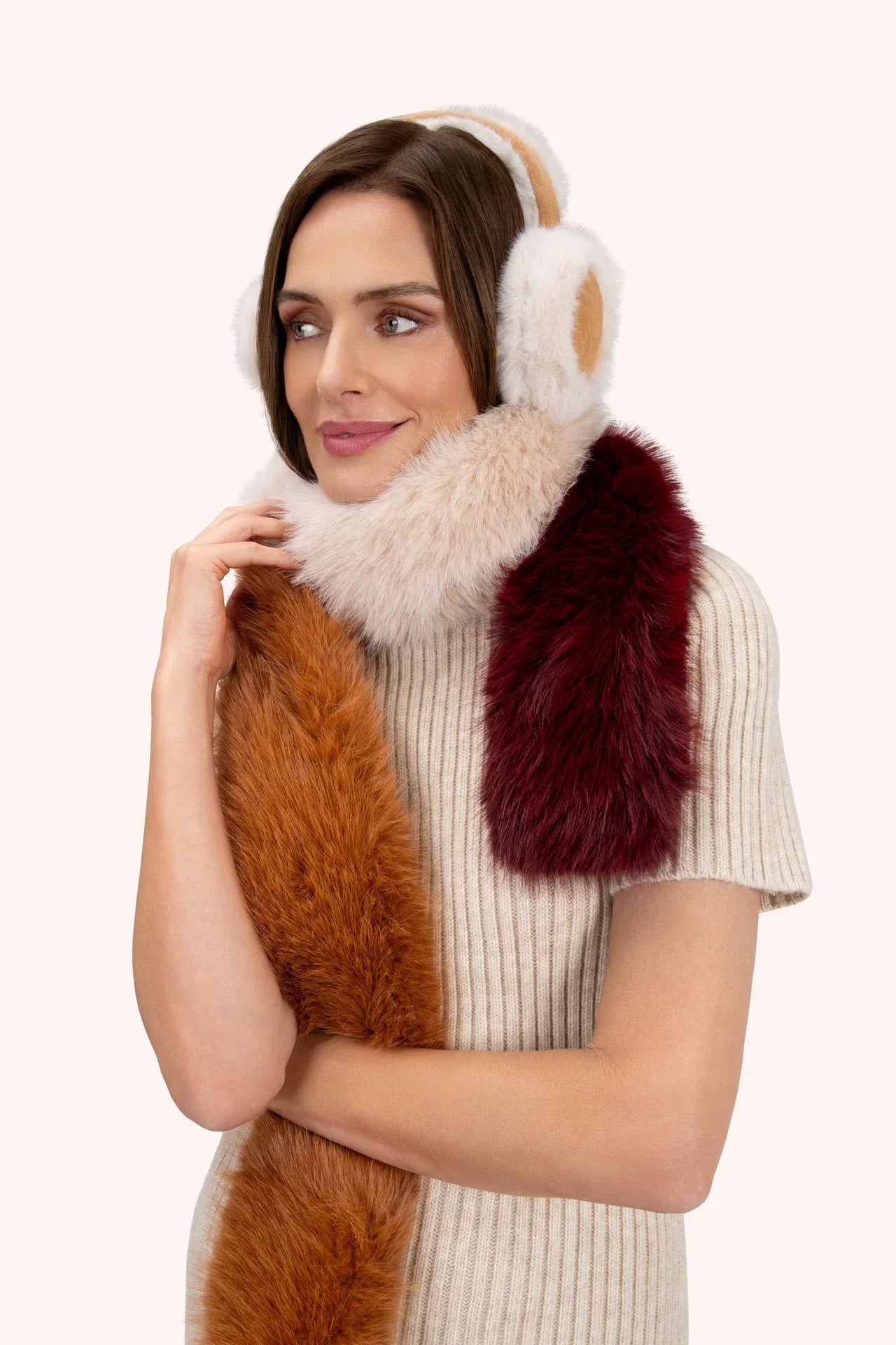 Cozy cream faux fur earmuffs in white and tan plush design