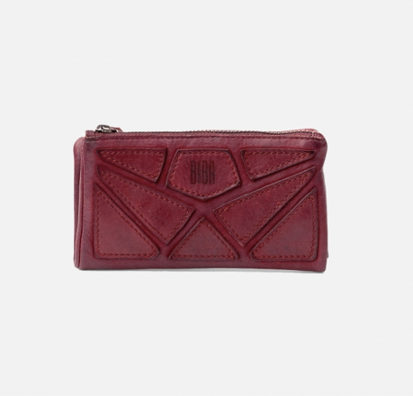 Rich burgundy Dior Donnie purse with geometric stitching