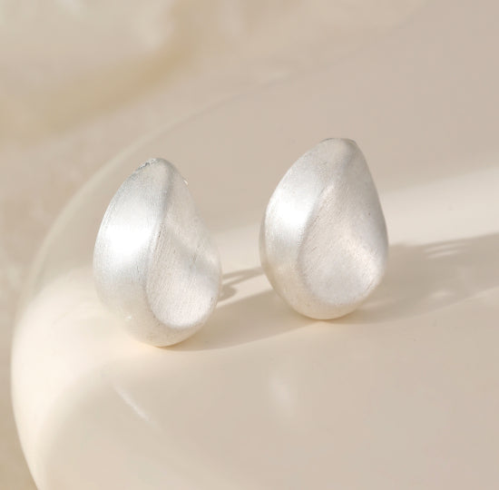 Silver tear clip on earrings