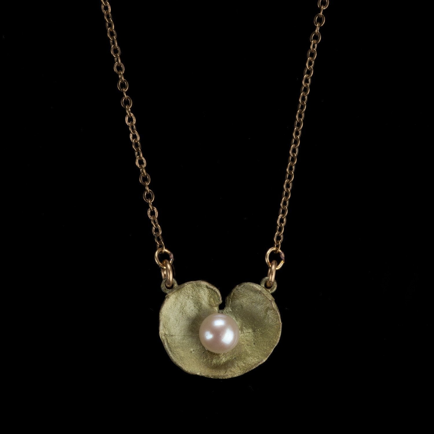 Delicate gold Geranium Pendant necklace with leaf pendant and pearl
