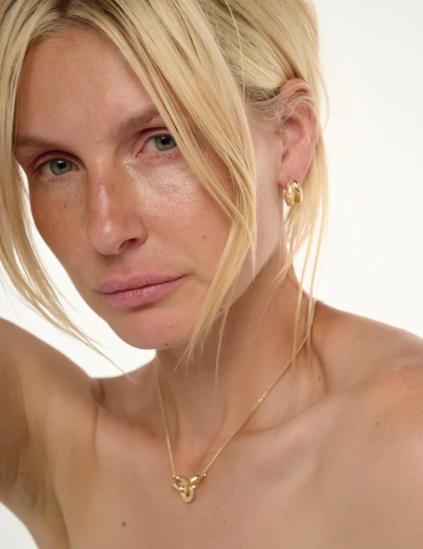 Gold Bind Necklace with ram head pendant on delicate chain