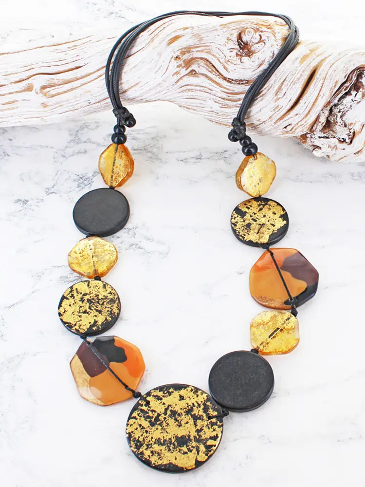 Vibrant amber black beaded Long Resin Wood Necklace with gold leaf accents