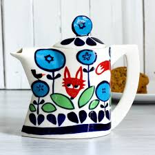 Small Flora Teapot: white ceramic with blue red floral patterns