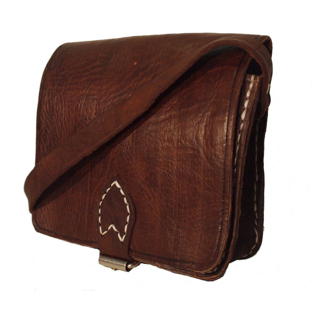 Dark brown small square leather saddle bag with heart flap and white stitching