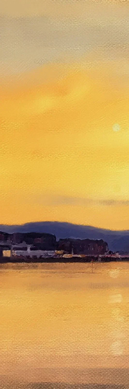 Golden sunset over Cardwell Bay water with silhouetted hills