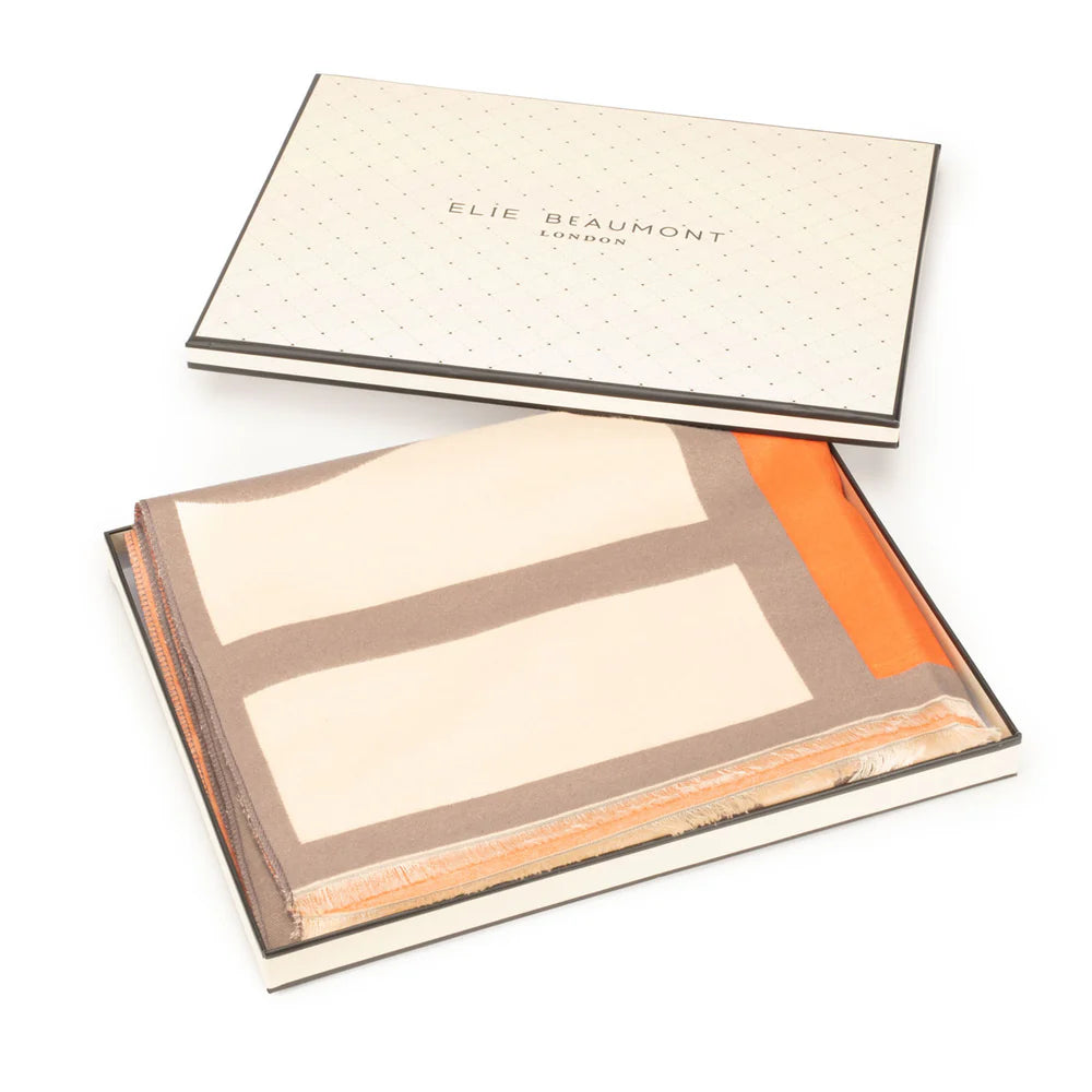 Elegant beige and orange geometric silk scarf by Elie Beaumont London in box