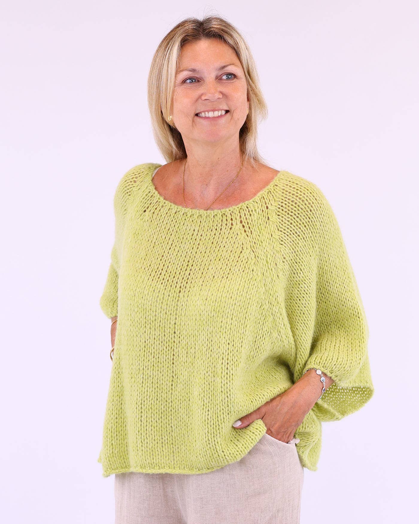 Soft lime-green Alpaca Blend Swing Jumper with loose fit and wide sleeves