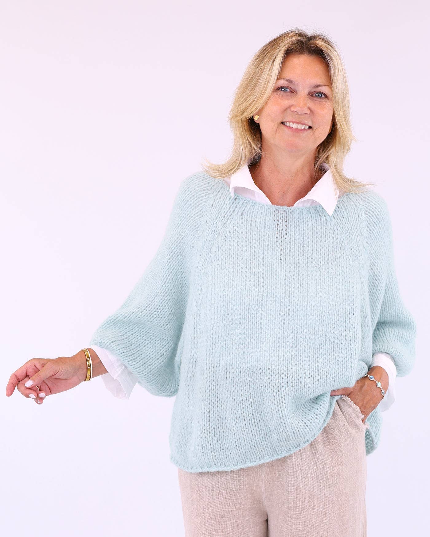 Light blue loose-fit alpaca blend swing jumper in soft moss with white collar