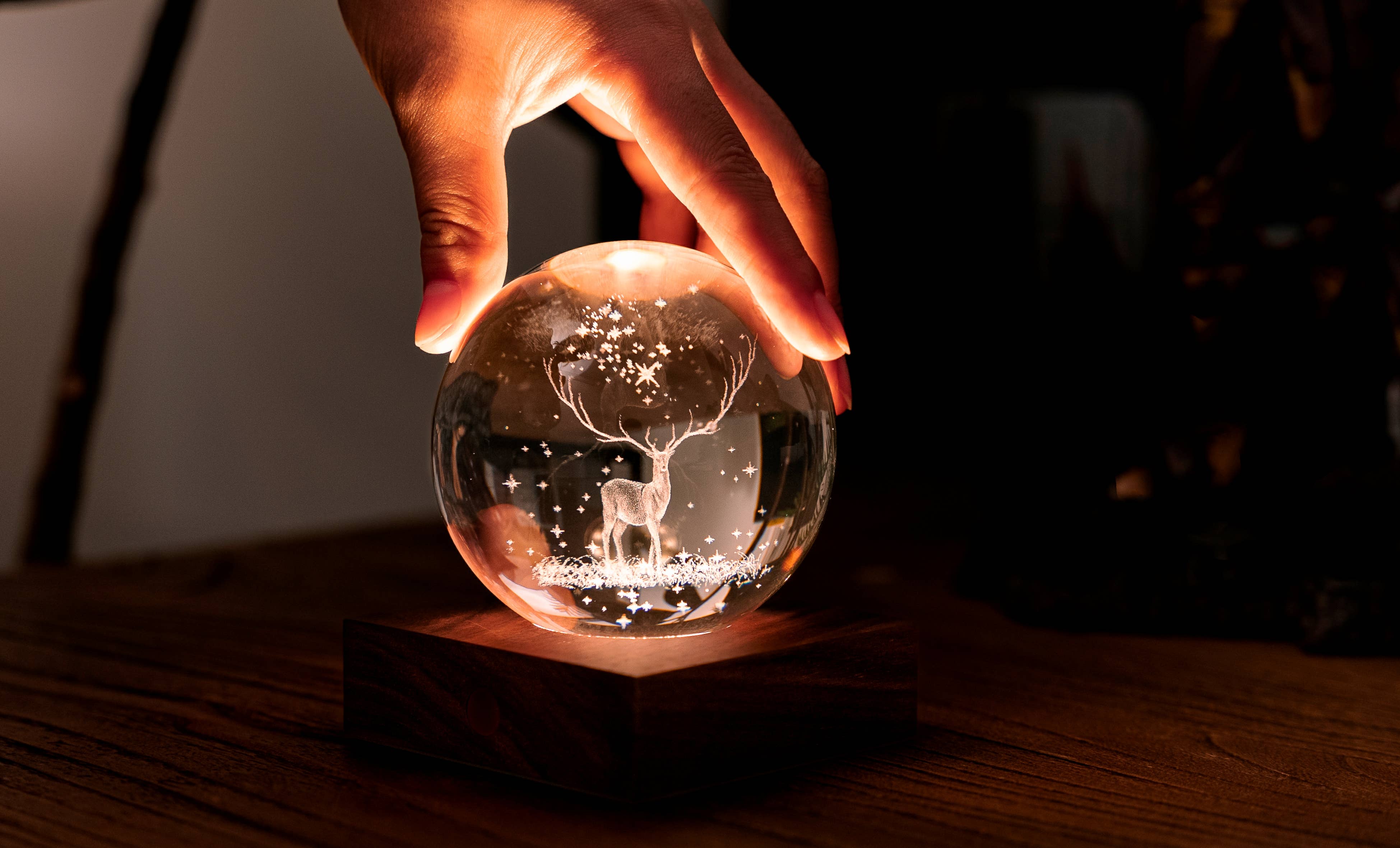 Amber Crystal Light Dandelion: etched deer globe with stars and snowflakes