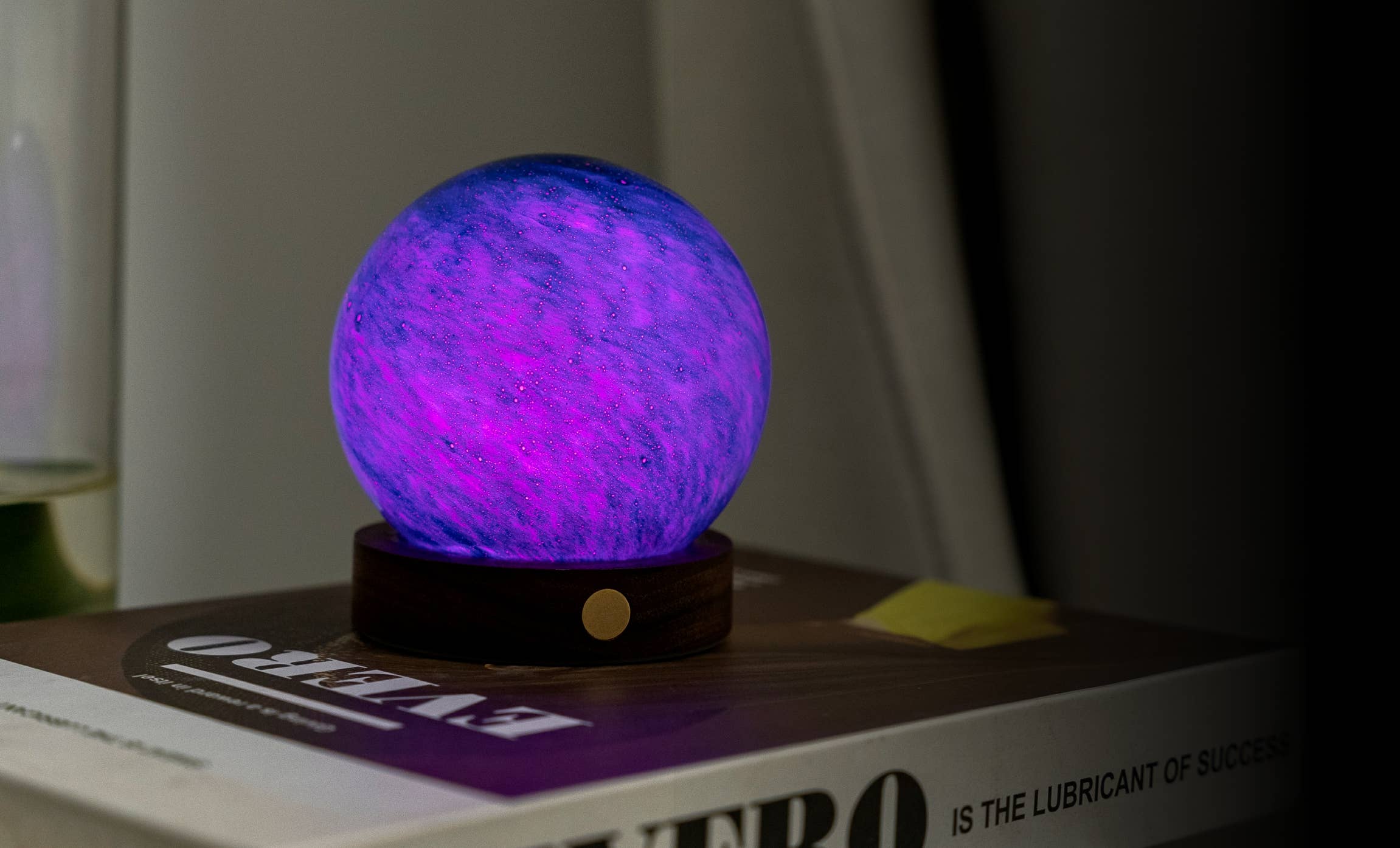 AstraGlass Light Large Sand Storm: glowing purple-blue marble lamp on wood base
