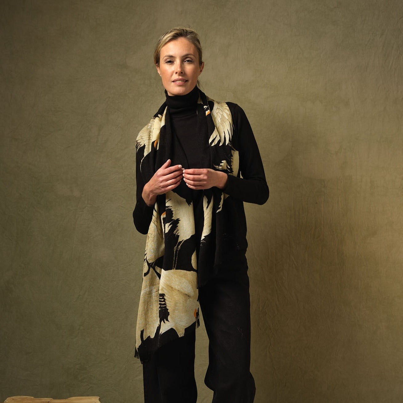 Black Stork wool scarf in black and cream with bold abstract wing pattern