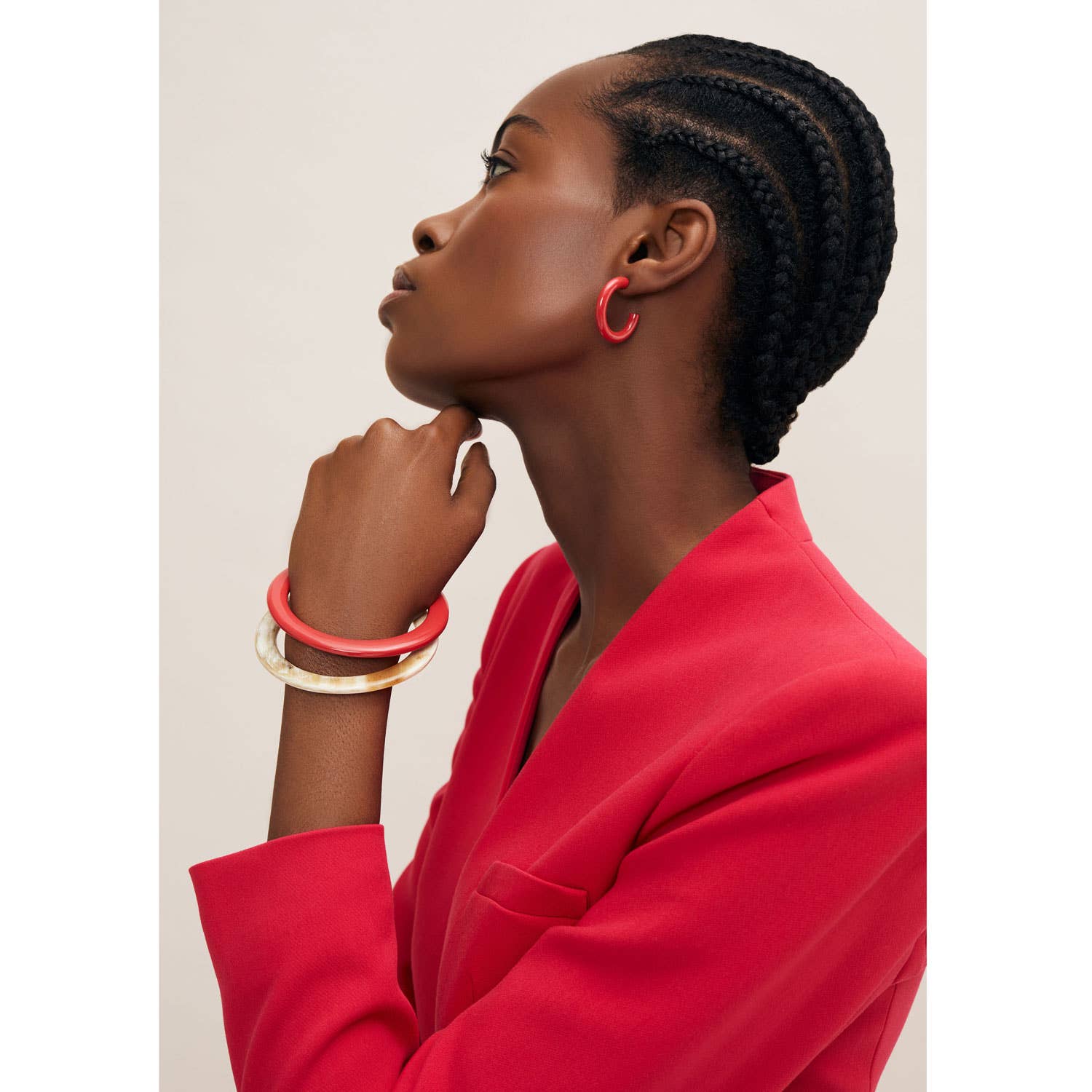 Vibrant white natural buffalo horn coral hoop earrings with glossy finish