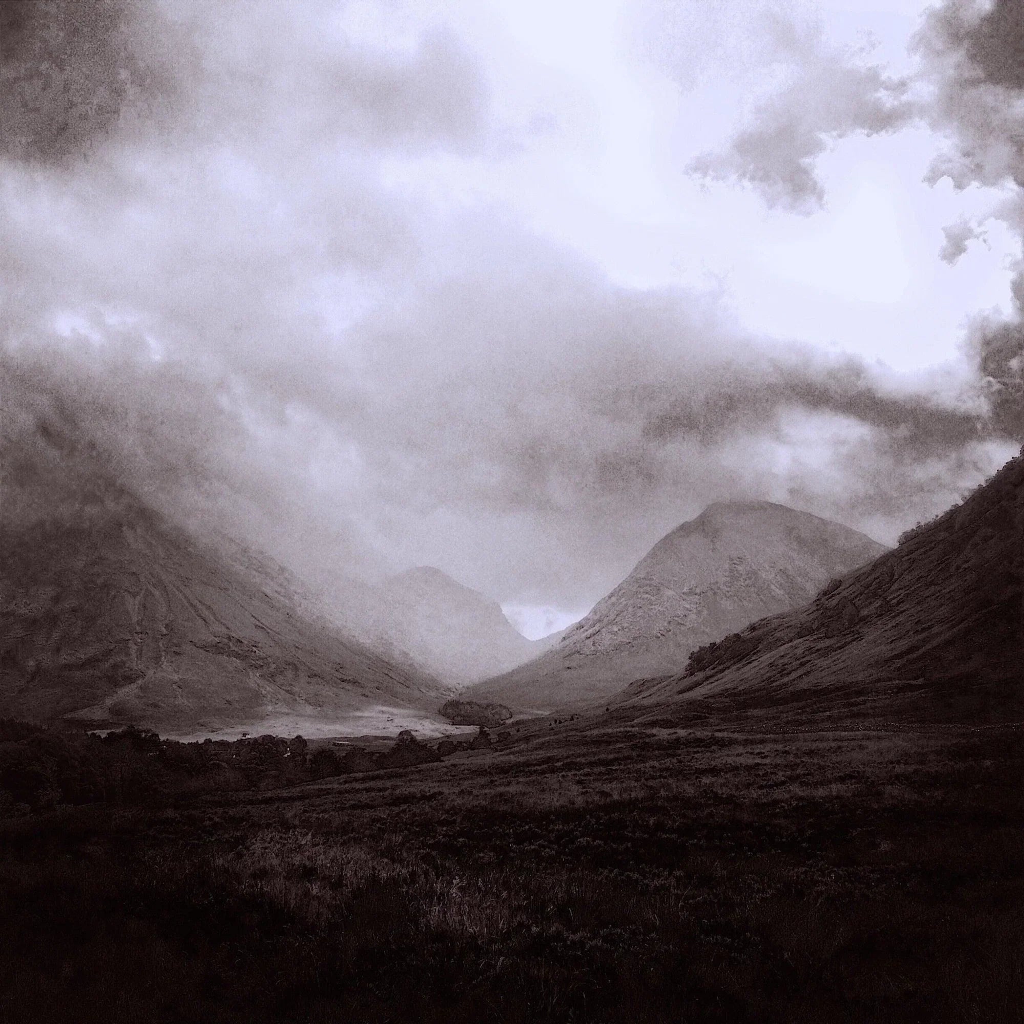 Glencoe Mist: Misty Scottish mountain valley with rugged peaks
