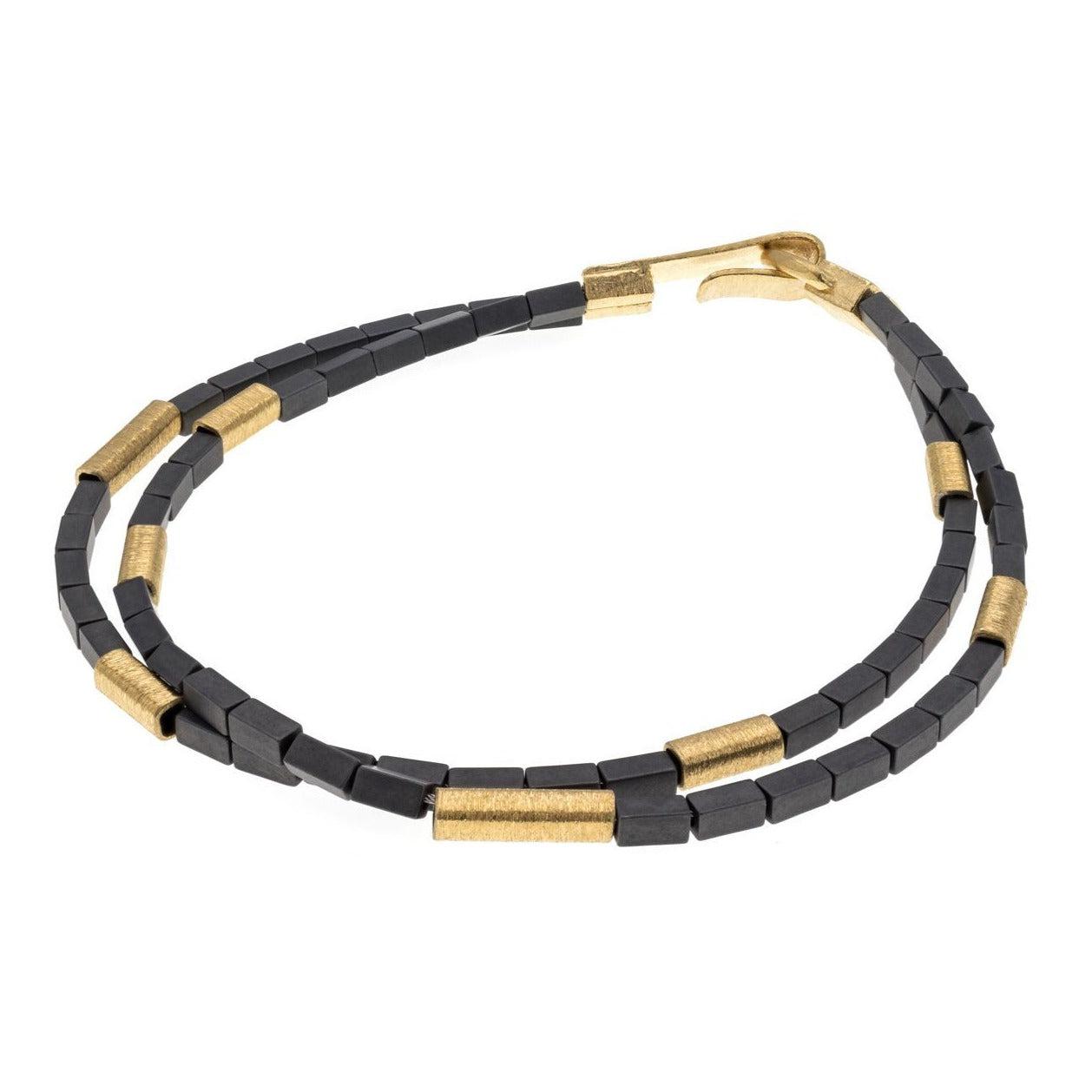 Black and gold hematite two-strand beaded necklace bracelet