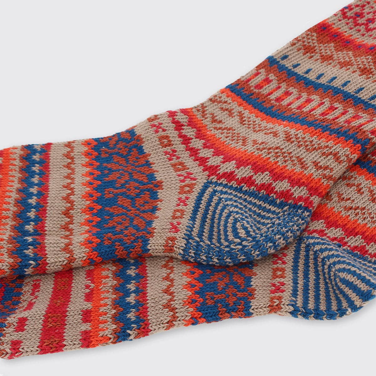 Men’s Fairisle socks in red, blue, beige stripes with geometric patterns