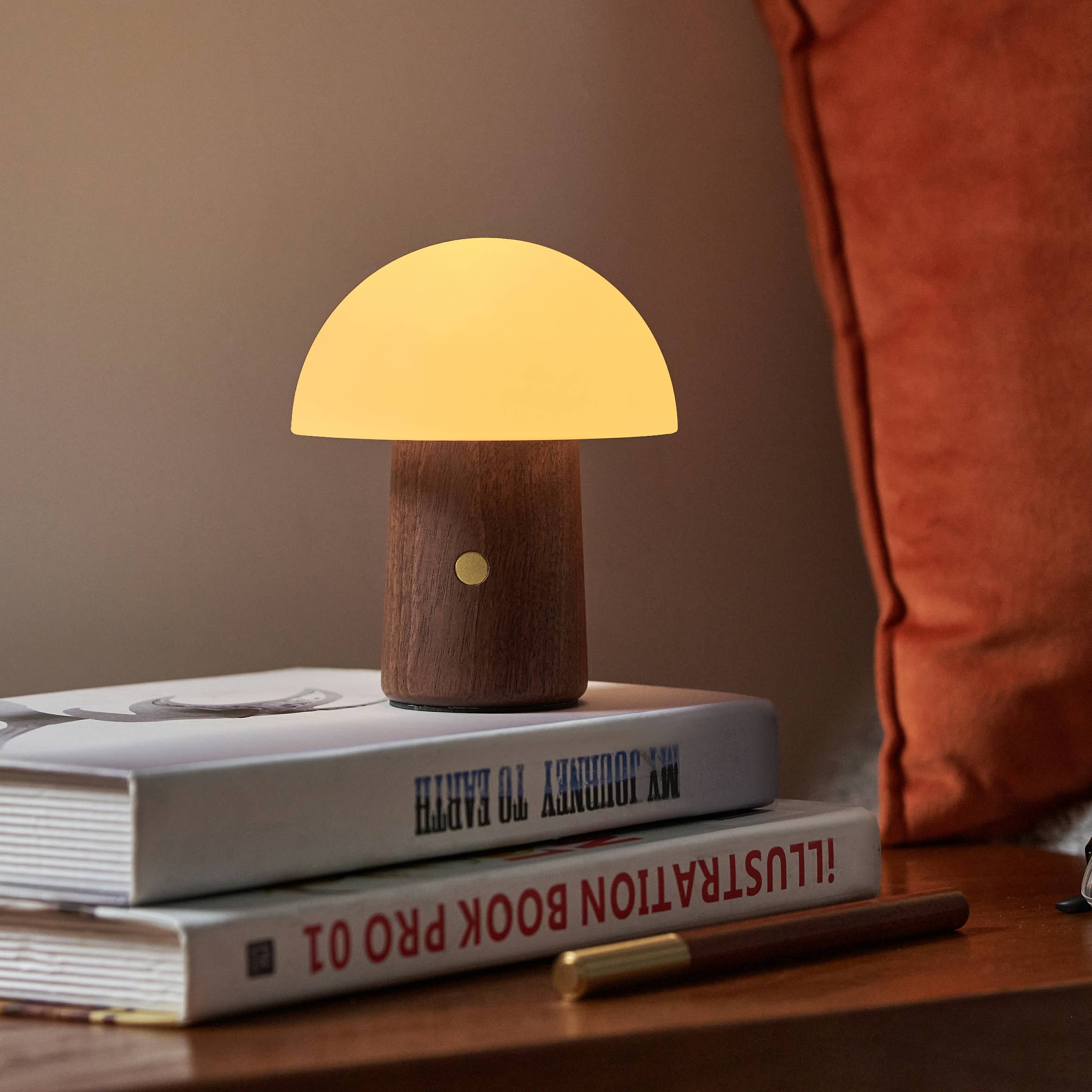 Mini Alice Mushroom Lamp: Warm yellow translucent dome on walnut base