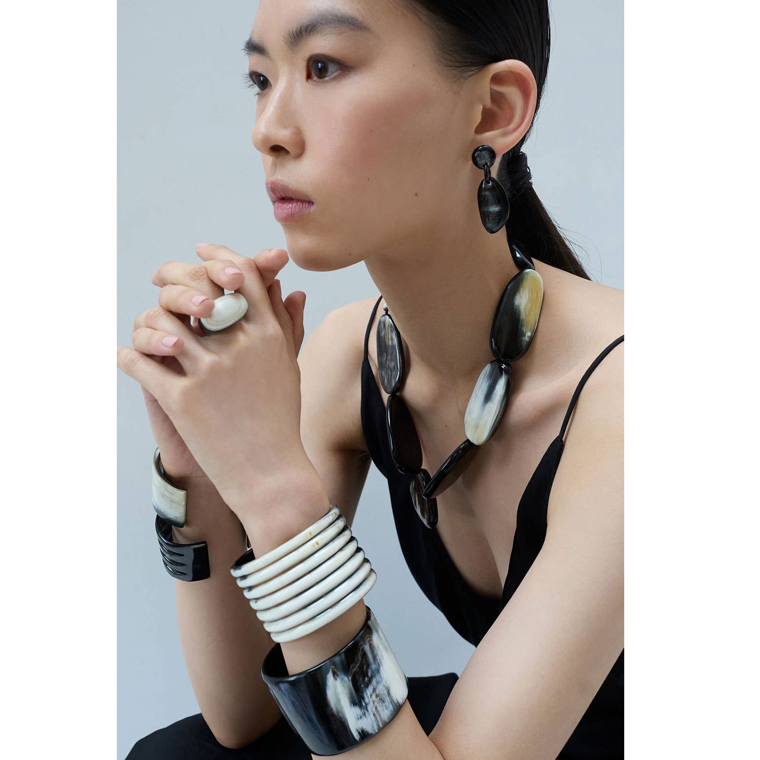 Black and white oval horn statement necklace with layered segments