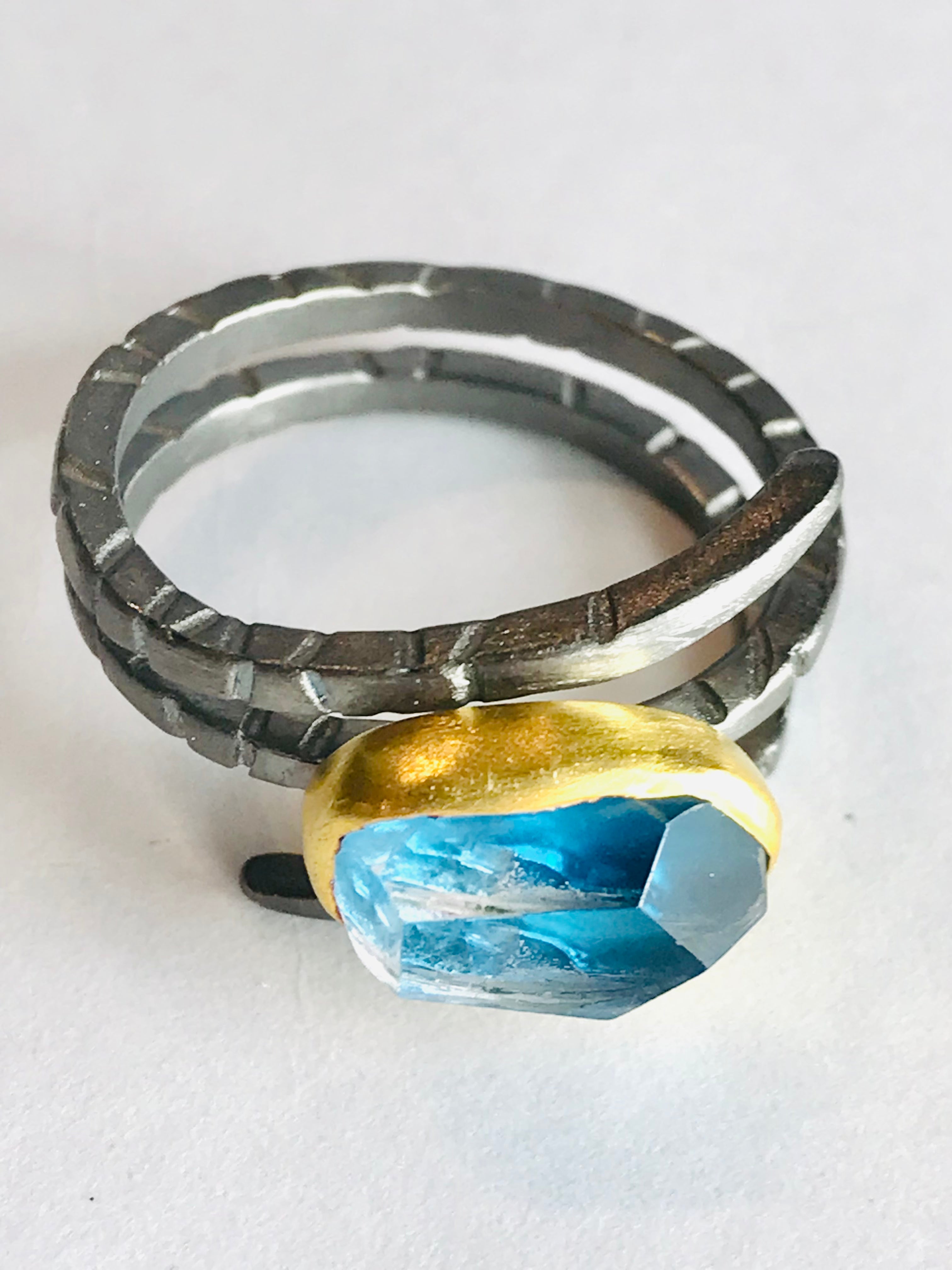 Oxidised silver ring with natural apatite gemstone and gold accents