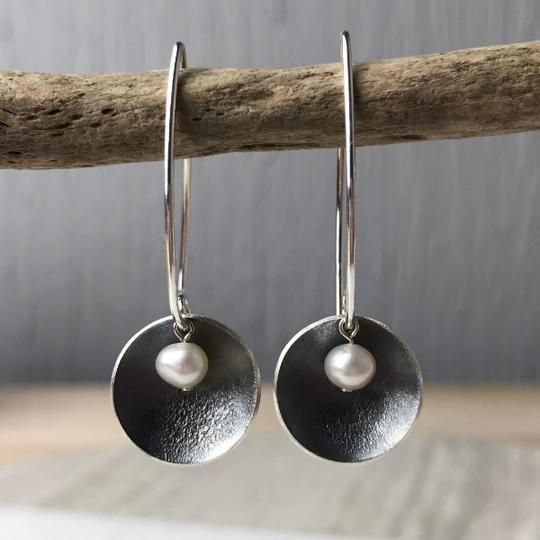 Oyster Earrings: Silver matte disc with freshwater pearl