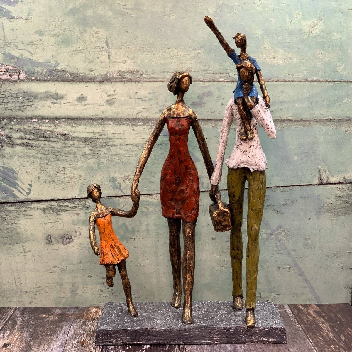 Stylized Picnic in the Park family sculpture with vibrant colors