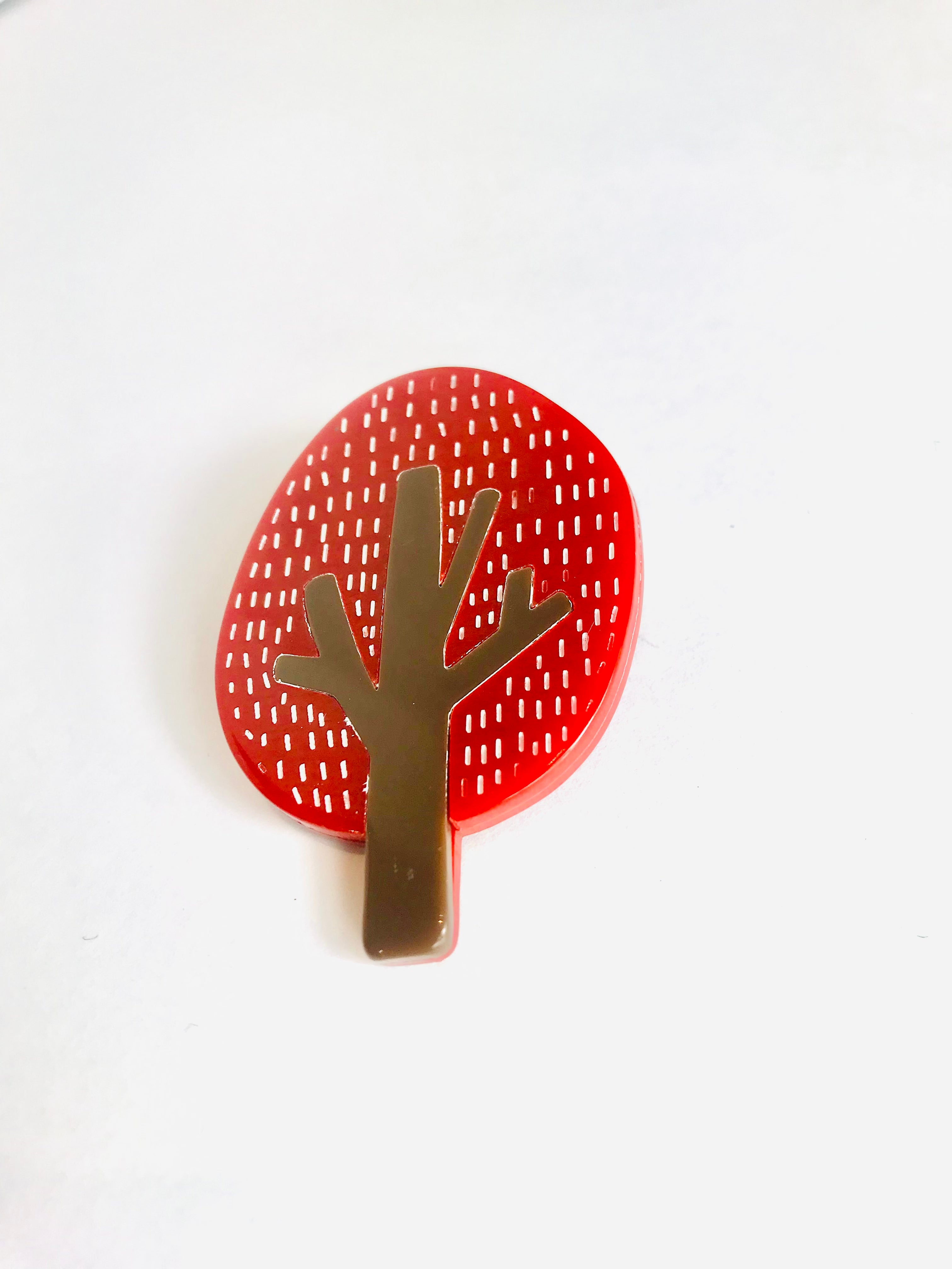 Red tree brooch with gold-toned trunk, branches, and dotted canopy