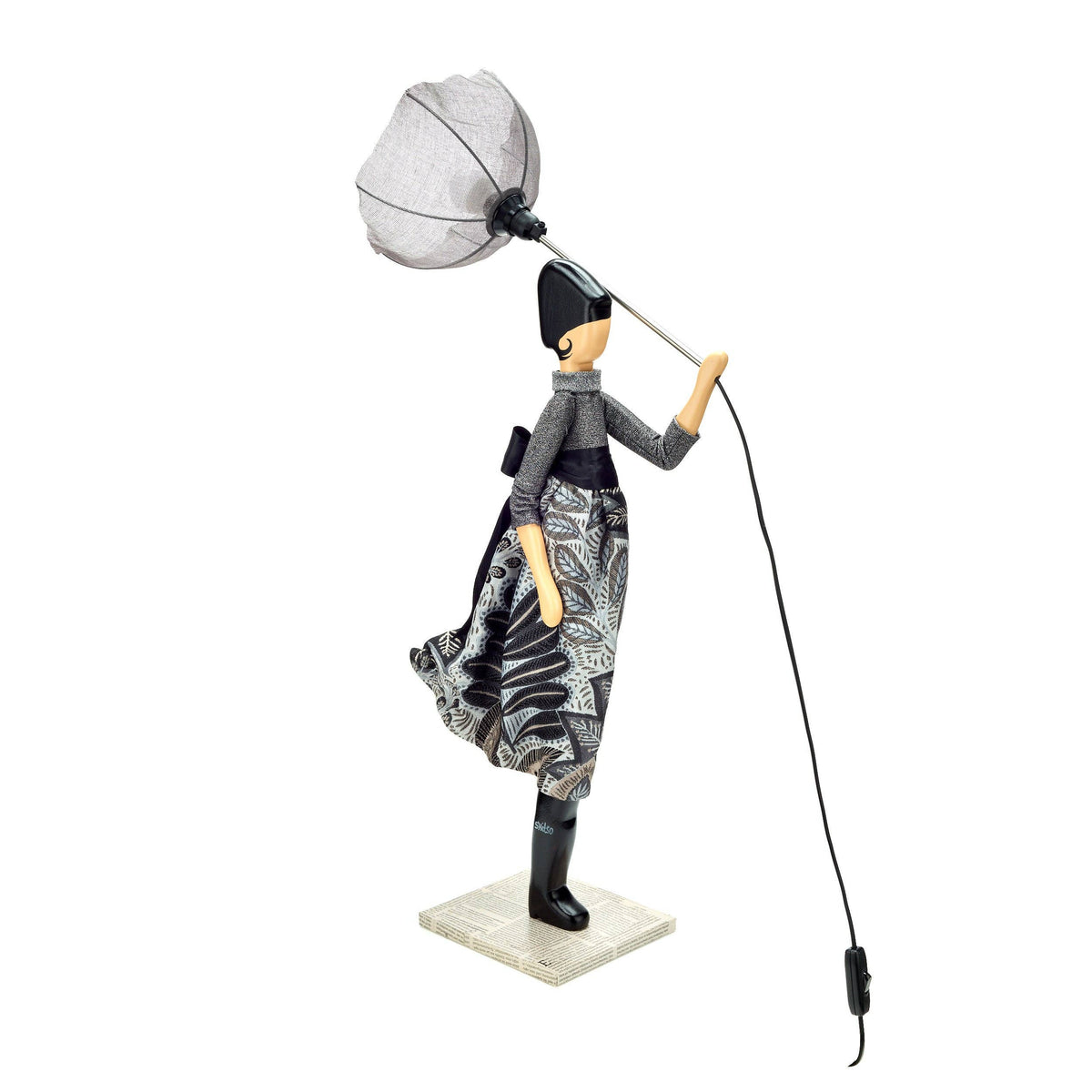 Saron Lady Lamp: stylish black and white patterned figurine with umbrella light