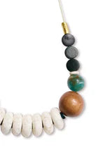 Turq Wood Green Cord necklace with white, gray, green beads and copper accent
