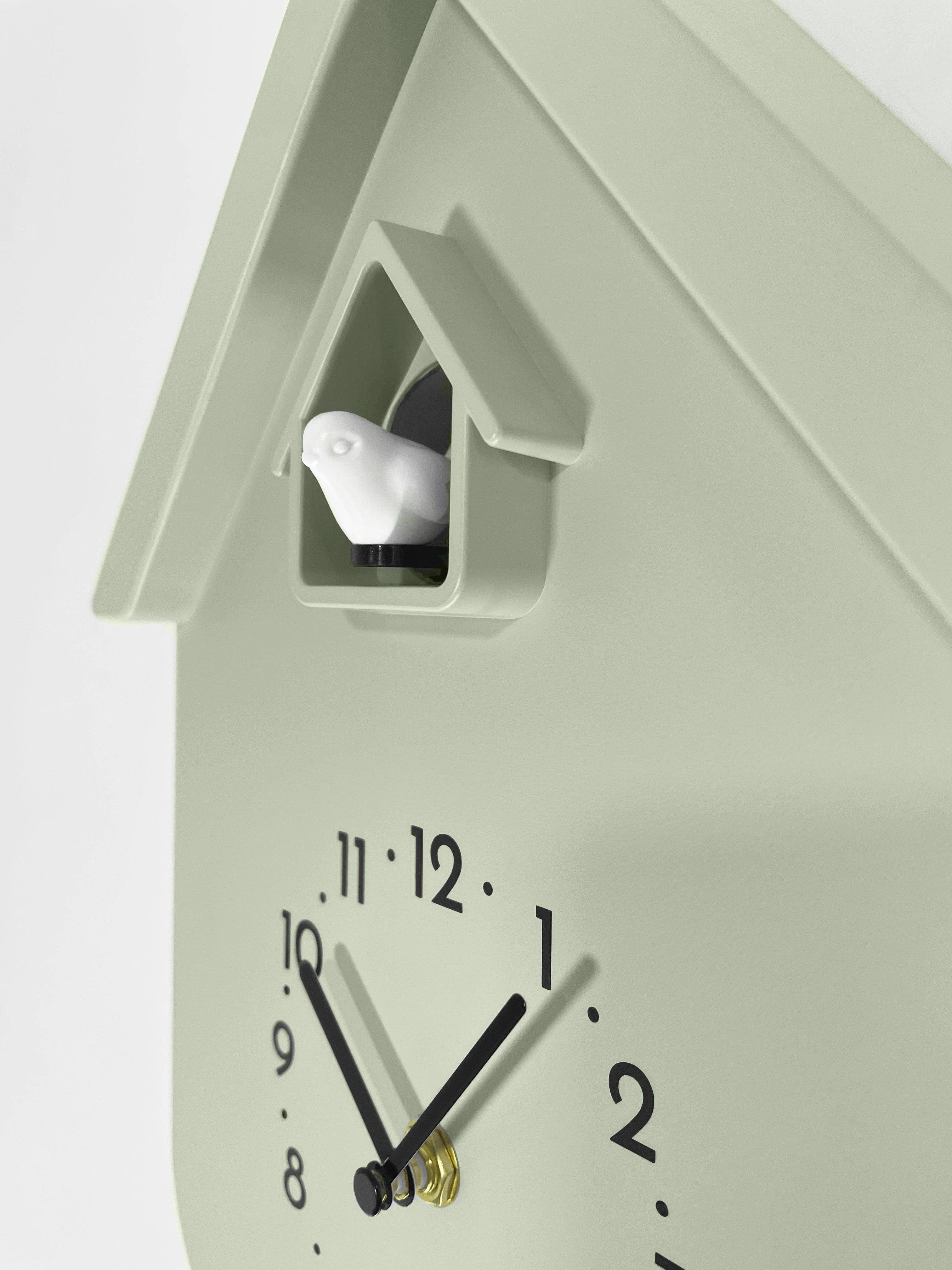 Matte sage green cuckoo wall clock with white bird figurine, NeXtime Twitter 21.5x41.5x8.5cm