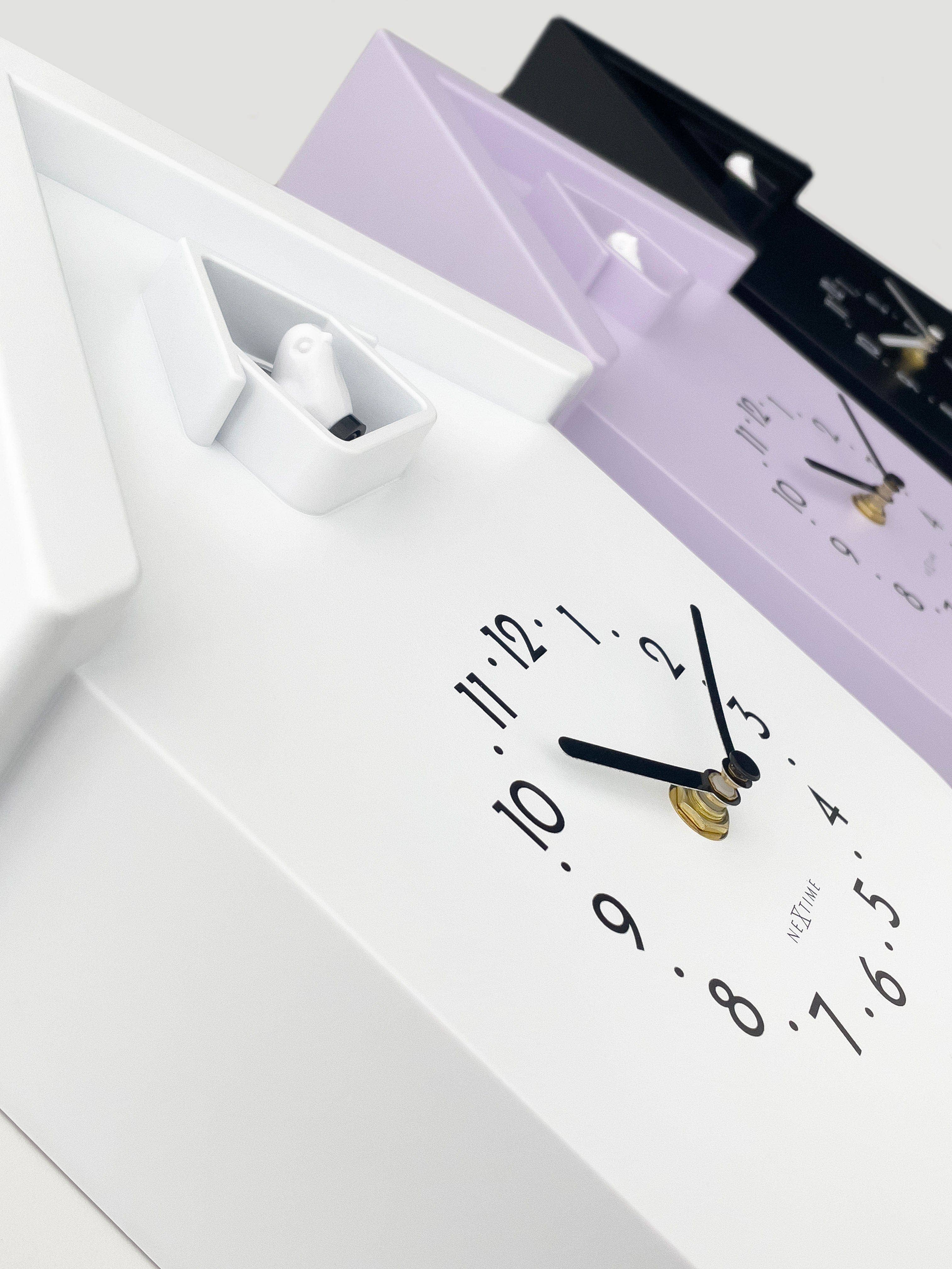 White NeXtime Twitter cuckoo pendulum wall clock with black numerals and gold hands